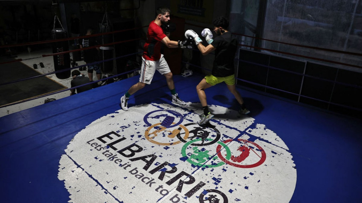 
Abu Sal spars with a partner at the gym in Ramallah. GETTY IMAGES