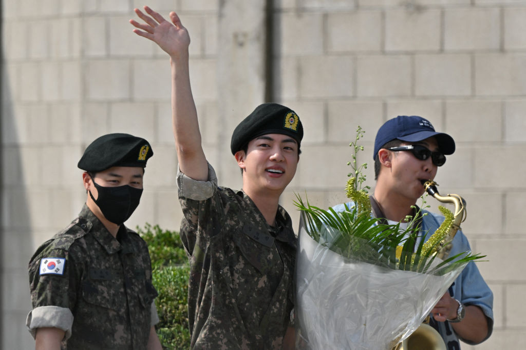 K-pop boy band BTS member Jin is slated to participate in the torch relay for the Paris Games. GETTY IMAGES