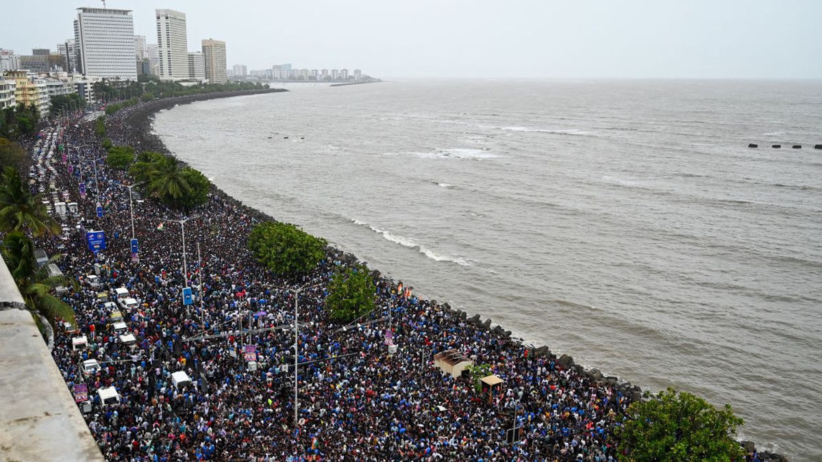 Fans gather at the Marine Drive seafront as they await the arrival of Indian cricket team in Mumbai on 4 July 2024. GETTY IMAGES