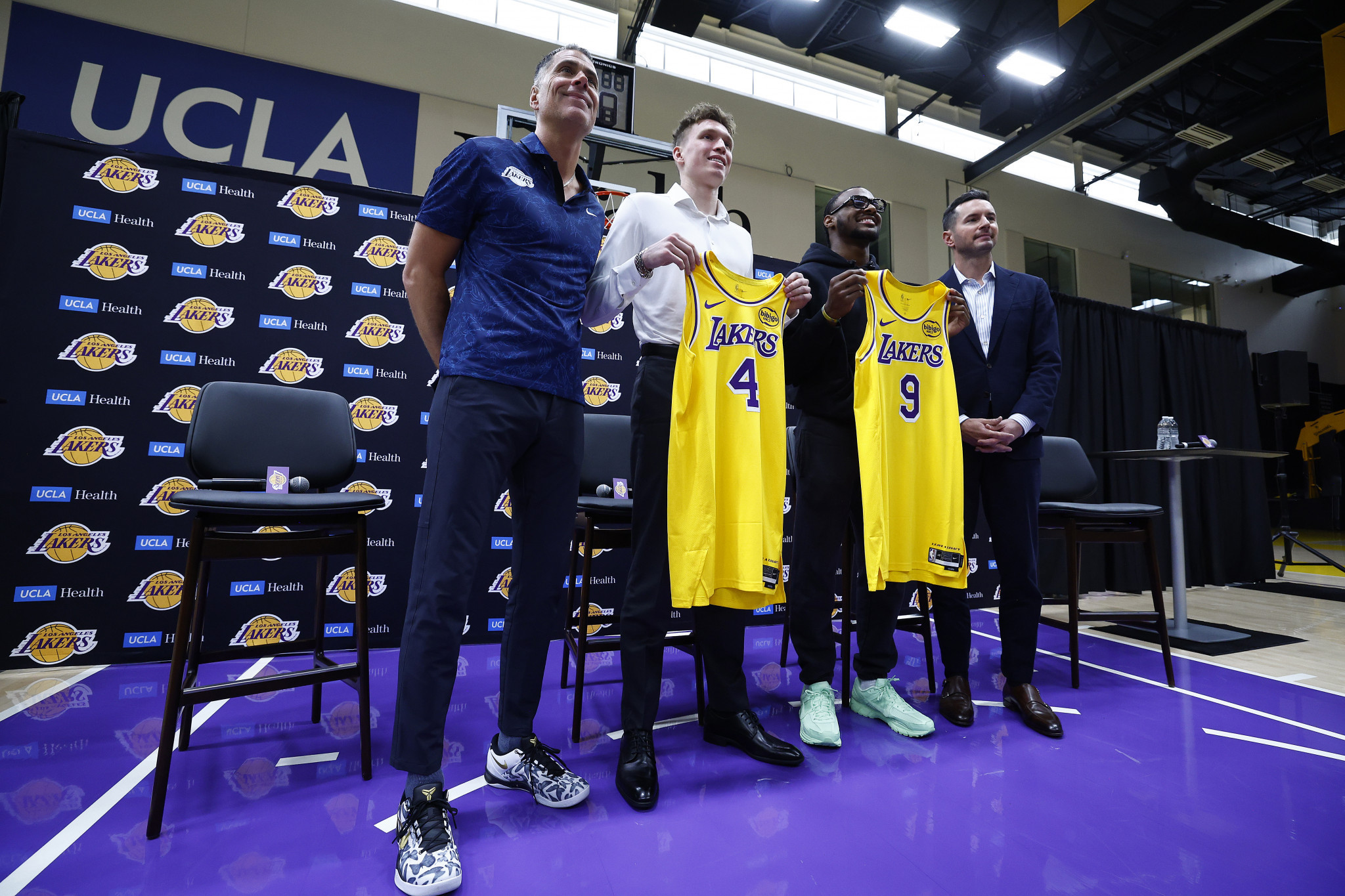 Rob Pelinka, Dalton Knecht, Bronny James and JJ Redick of the Lakers. GETTY IMAGES
