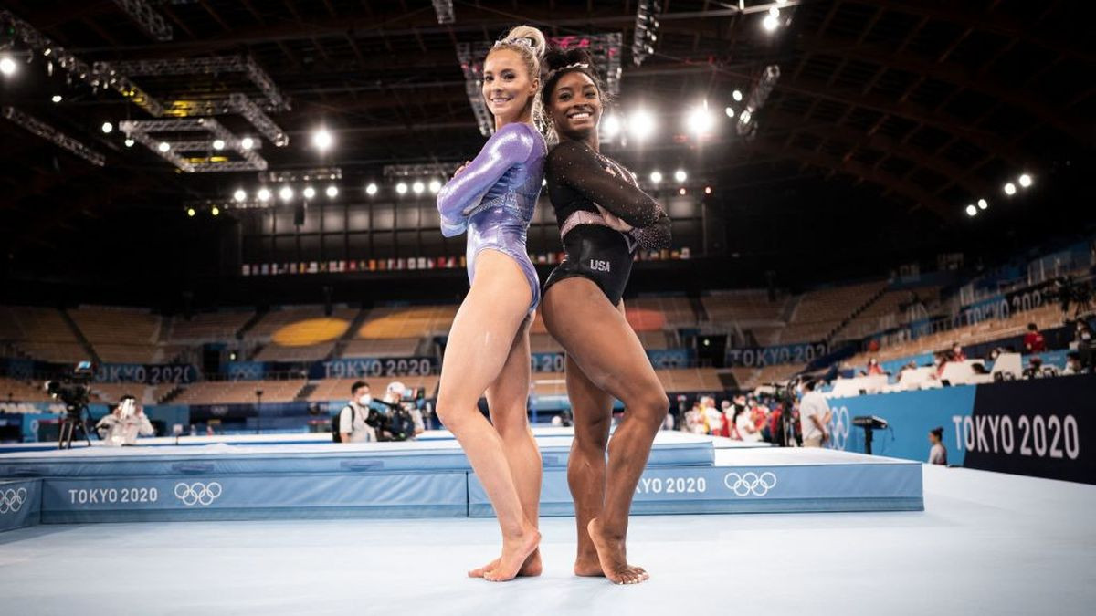 Simone Biles and MyKayla Skinner of Team United States watch the Men's All-Around Final on day five of the Tokyo 2020 on 28 July 2021 in Tokyo. GETTY IMAGES