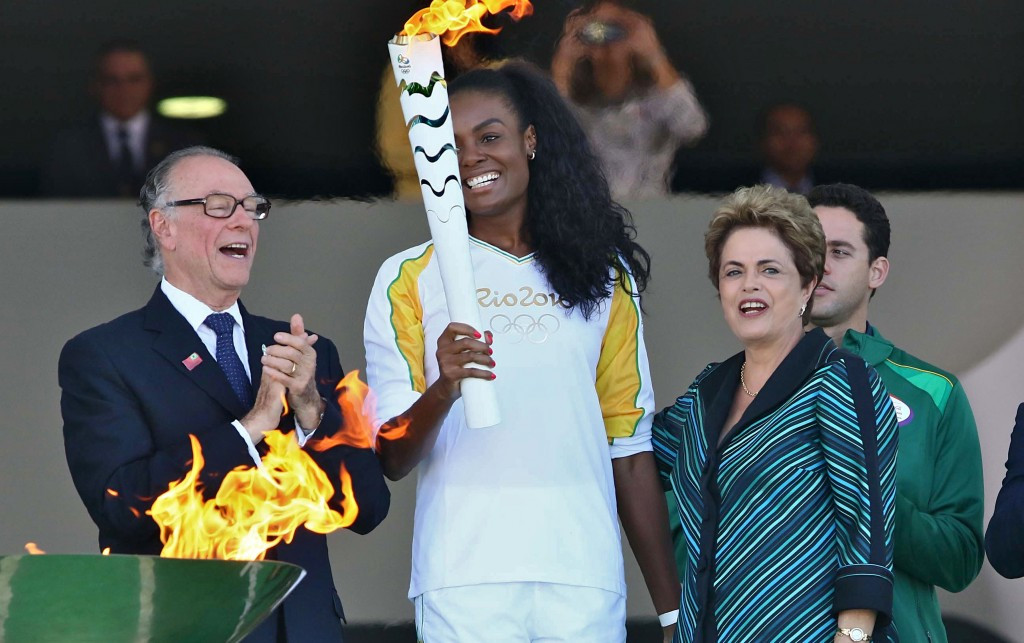 Two-time Olympic volleyball champion volleyball player Fabiana Claudino becomes the first flamebearer on Brazilian soil ©Getty Images