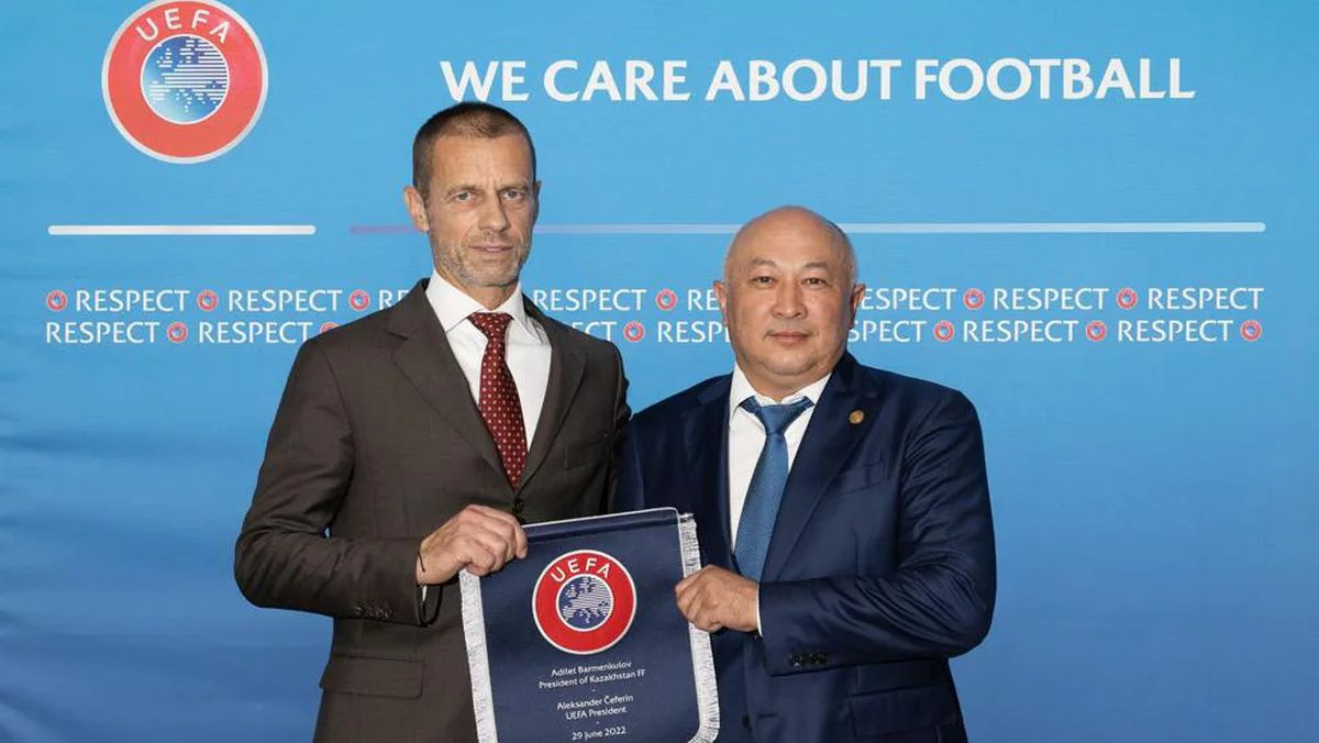 The president of the Kazakh Football Federation, Adilet Barmenkulov, with UEFA President Aleksander Čeferin. GETTY IMAGES