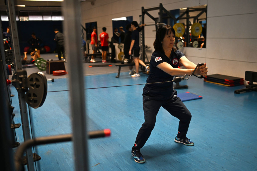 Zhiying Zeng exercises during a training session in Santiago. GETTY IMAGES