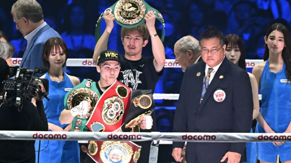 
Inoue showcases his four super bantamweight belts. GETTY IMAGES