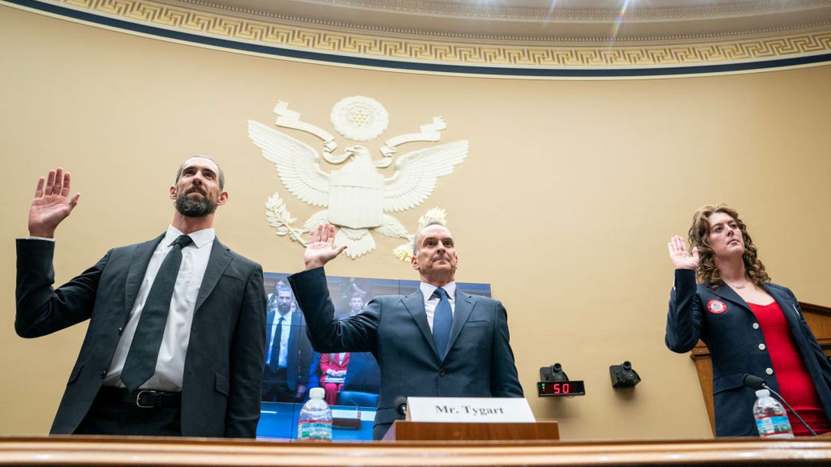 Michael Phelps, Travis Tygart, CEO of the, U.S. Anti-Doping Agency, and Allison Schmitt in the Rayburn House Office Building on Capitol Hill on 25 june 2024. GETTY IMAGES