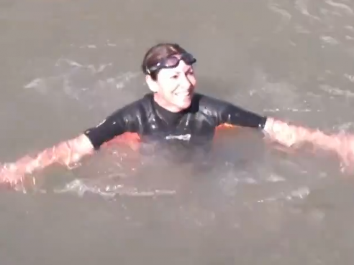 Paris Mayor Anne Hidalgo took a symbolic swim in the River Seine on Wednesday. ABC News