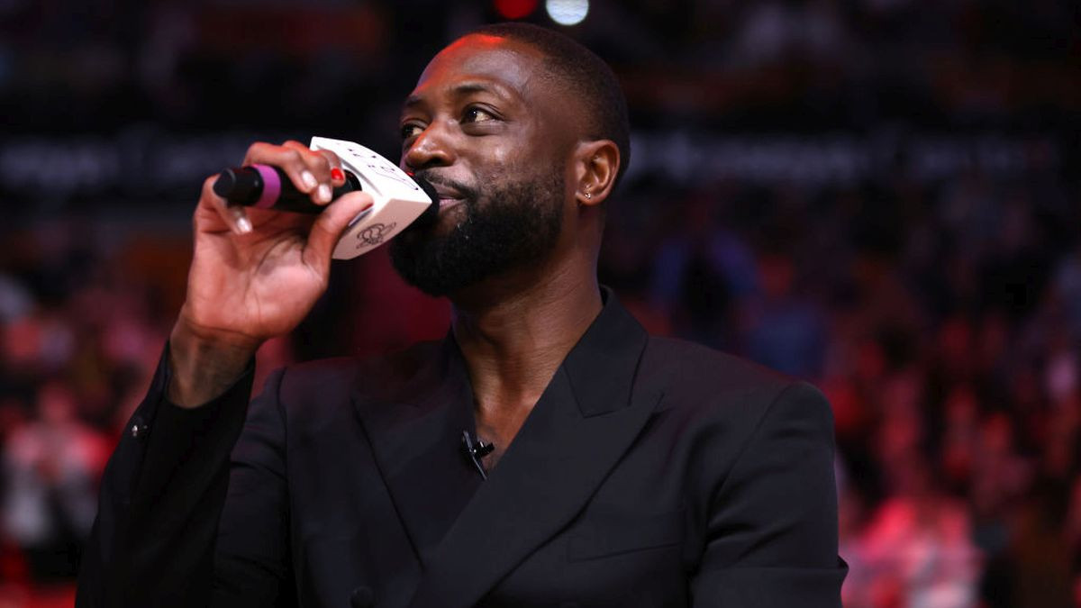 Former Miami Heat player Dwayne Wade addresses the crowd during a Hall of Fame induction ceremony. GETTY IMAGES