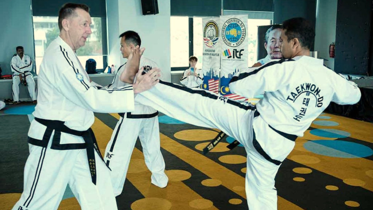 Grand Master Paul McPhail (left) was one of the speakers of the 178th International Instructor Course. ITFTKD