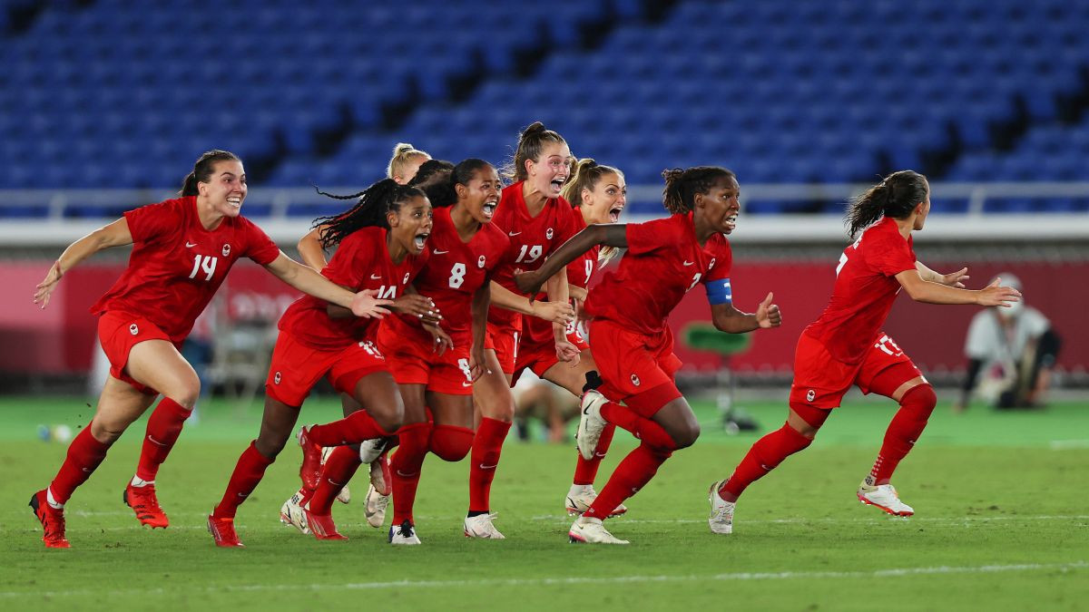 Team Canada players celebrate after their team's victory at Tokyo 2020. GETTY IMAGES