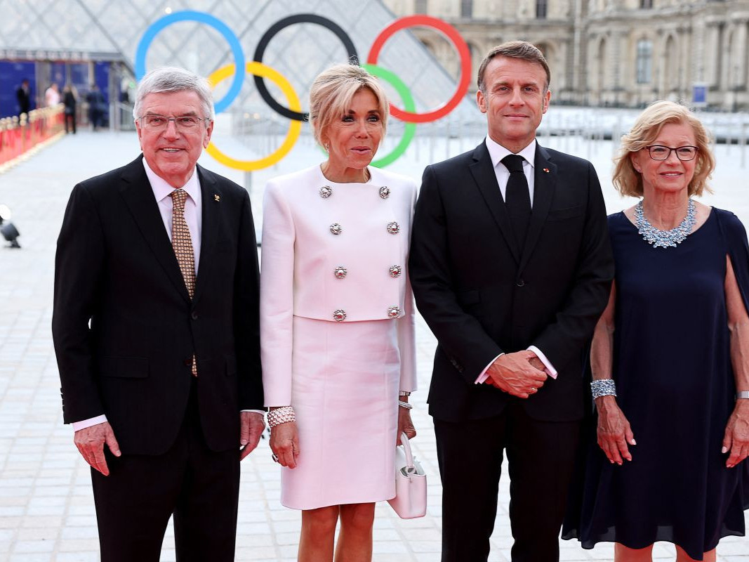 President of the IOC Thomas Bach, wife wife Claudia Bach, French President Emmanuel Macron and his wife Brigitte Macron. GETTY IMAGES
