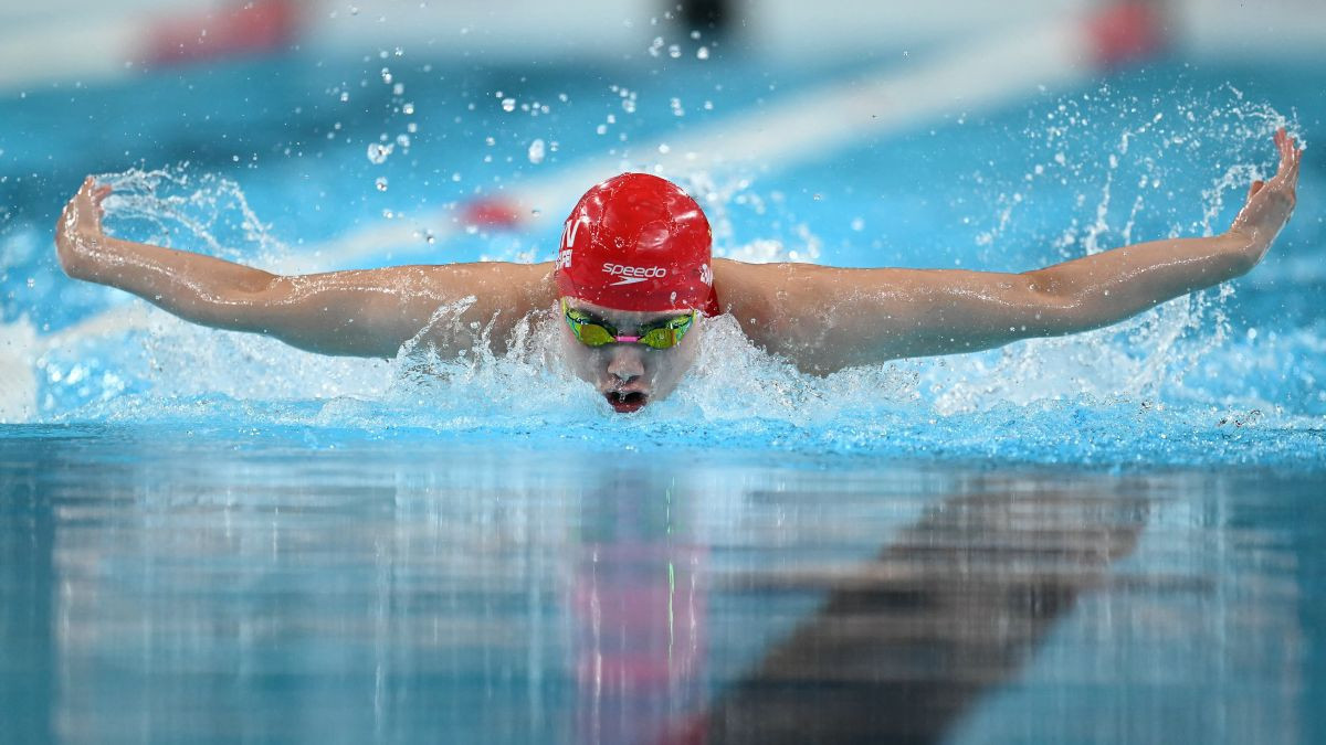 China's Zhang Yufei competes in a heat of the women's 100m butterfly swimming event during Paris 2024. GETTY IMAGES