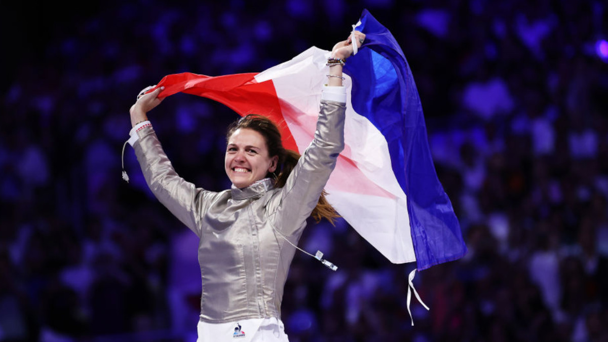 Manon Apithy-Brunet and the first French Olympic fencing champion. GETTY IMAGES