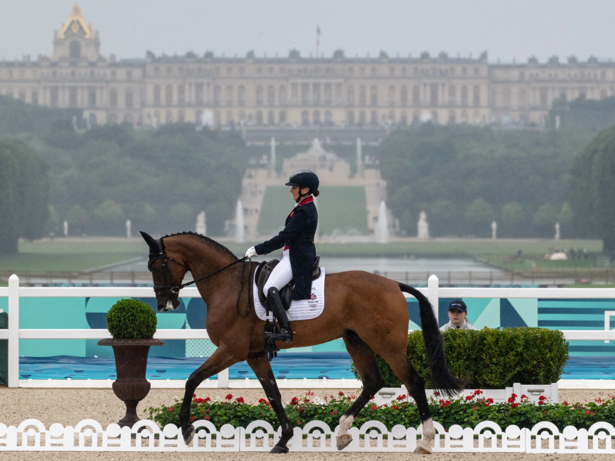 Britain's Laura Collett with horse London 52 in front of the Chateau de Versailles at the Paris 2024 Olympic Games.