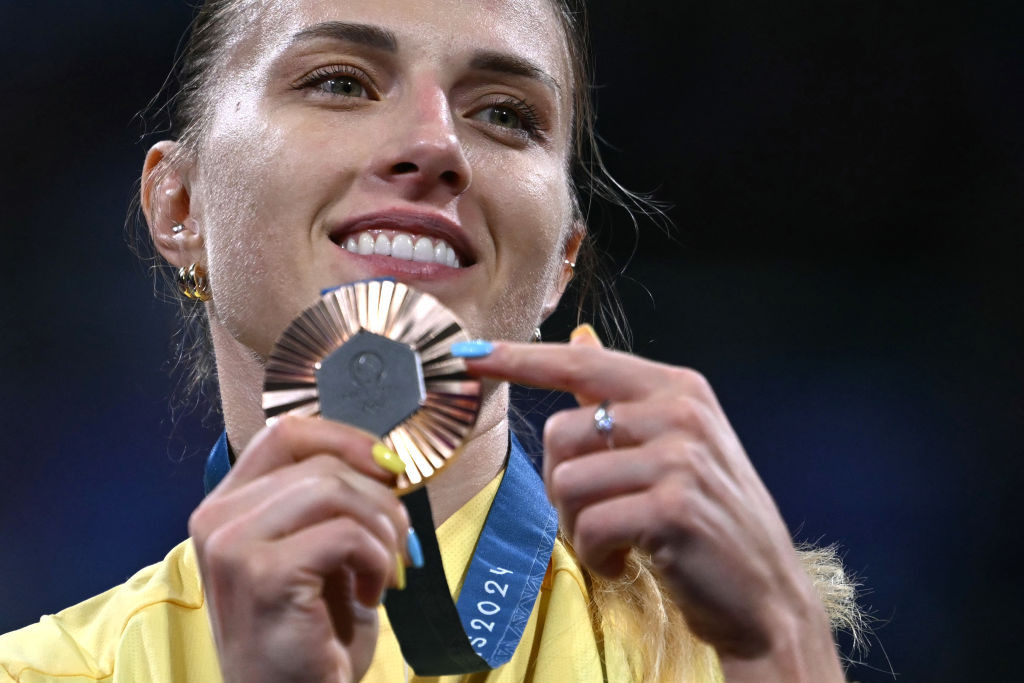 Bronze medallist Ukraine's Olga Kharlan dedicated her win to her war-torn country. GETTY IMAGES
