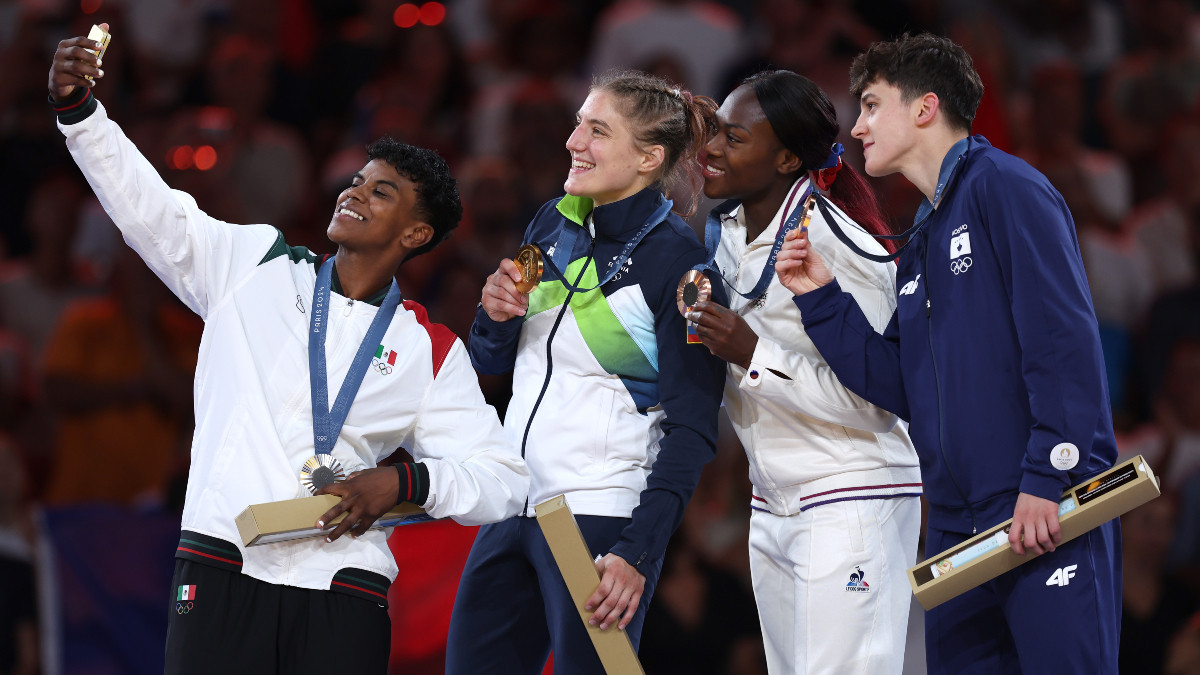 Medallists of the women's 63 kg category. GETTY IMAGES