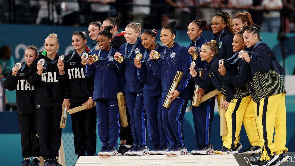 Silver medalists Team Italy, Gold medalists Team United States and Bronze medalists Team Brazil pose on the podium during the medal ceremony. GETTY IMAGES