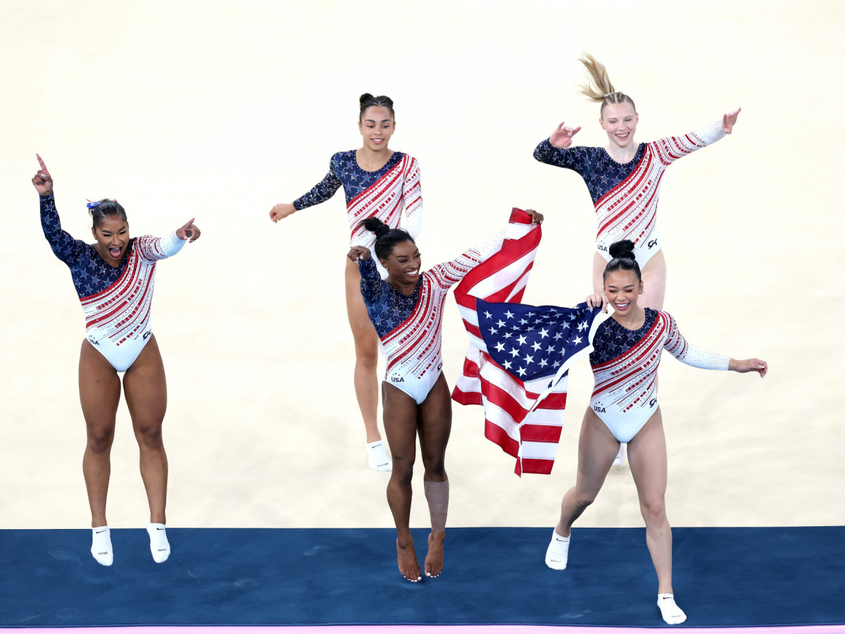 Jordan Chiles, Hezly Rivera, Simone Biles, Sunisa Lee and Jade Carey of Team United States celebrate after winning gold in the Artistic Gymnastics Women's Team Final on day four of the Paris 2024 Olympic Games. GETTY IMAGES