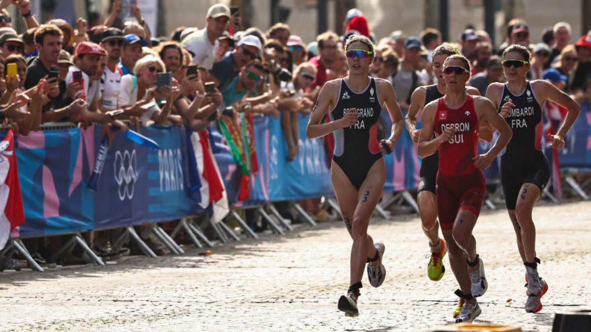 France's Cassandre Beaugrand leads as she competes in the race during the women's individual triathlon in Paris 2024. GETTY IMAGES