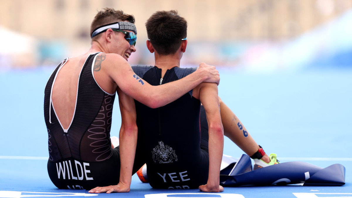 Gold medalist Alex Yee and Silver medalist Hayden Wilde celebrate after crossing the line during Men's Individual Triathlon. GETTY IMAGES