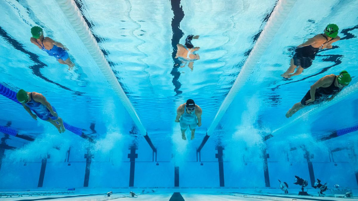 An underwater view shows competing in a heat of the women's 200m. GETTY IMAGES