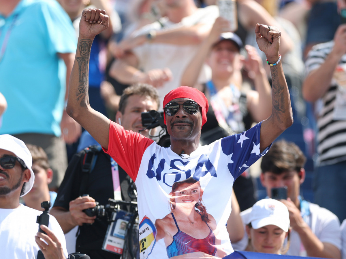 Snoop Dogg supporting Team United States against Team France at a beach volleyball match during the Paris 2024 Olympic Games. GETTY IMAGES