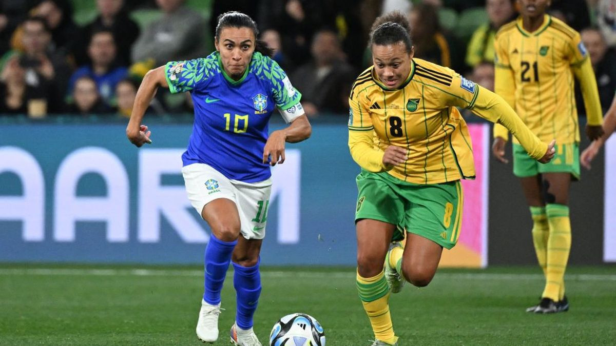  Marta (L) fighting for the ball with Jamaica's midfielder Drew Spence during the Australia and New Zealand 2023 Women's World Cup. GETTY IMAGES