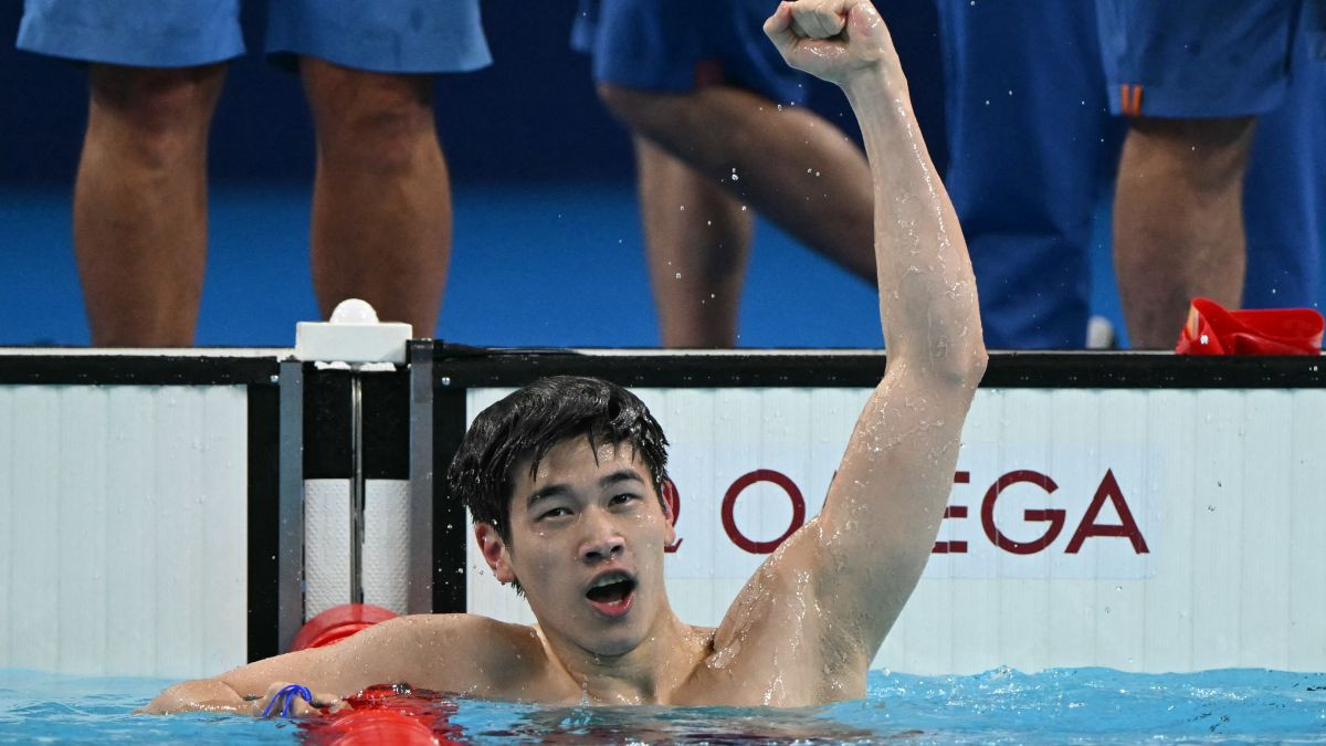  Zhanle reacts after winning gold and breaking a world record in Paris 2024. GETTY IMAGES