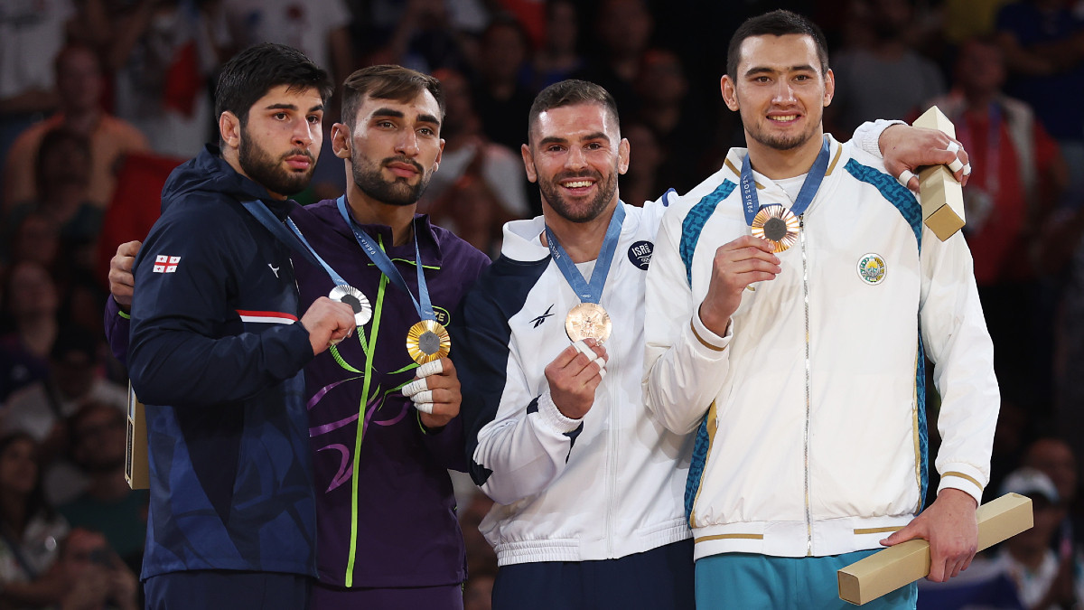 Medallists of the men's -100 kg category. GETTY IMAGES