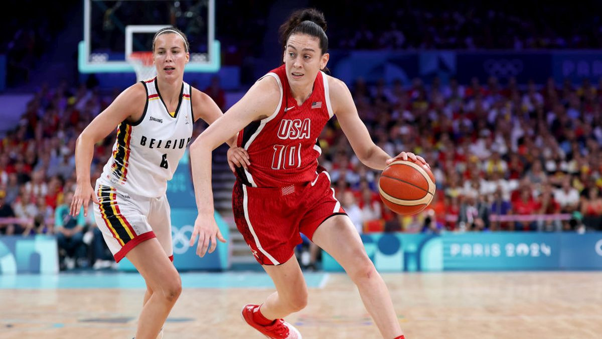 Breanna Stewart drives past Antonia Delaere. GETTY IMAGES