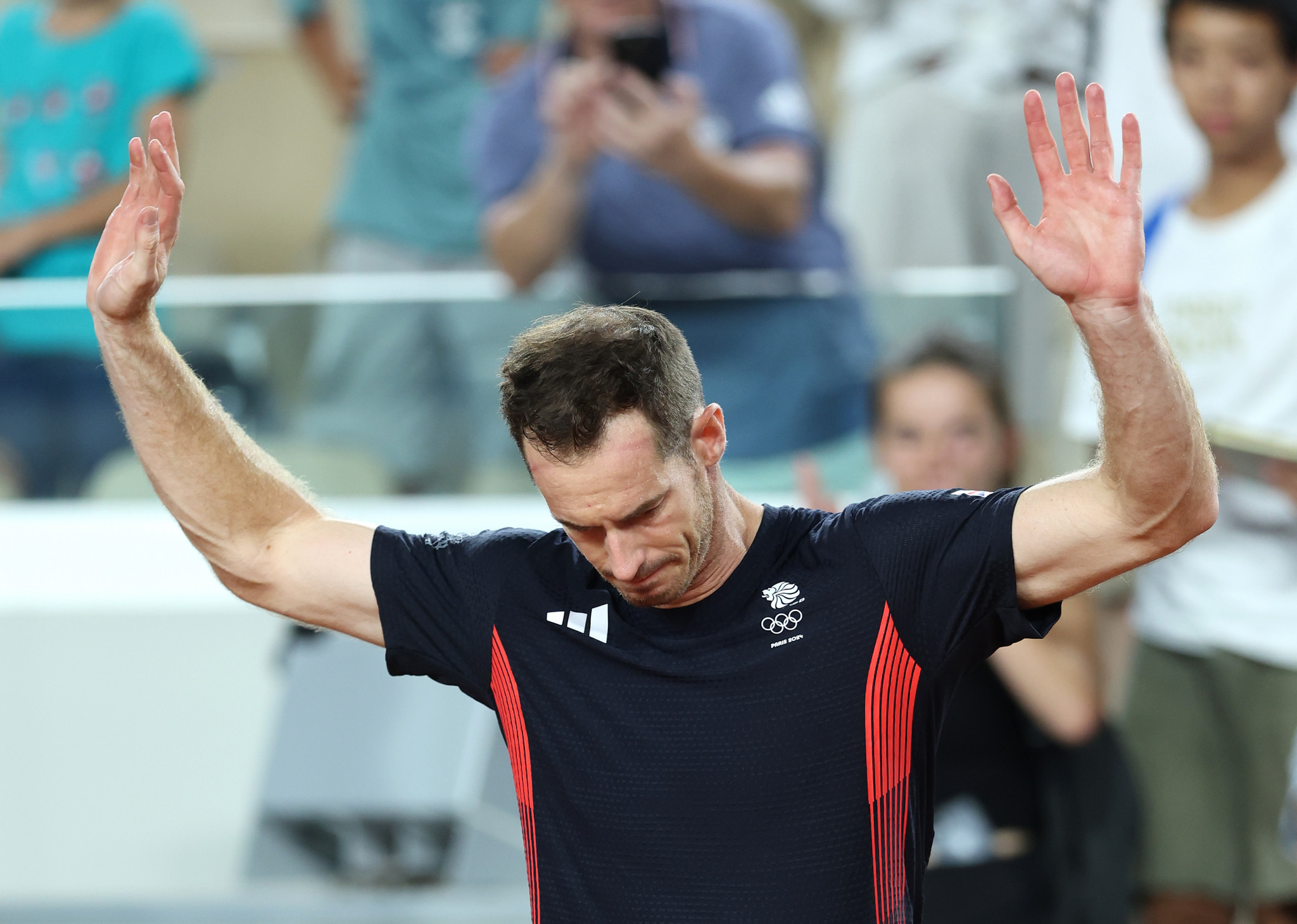 Andy Murray of Team GB acknowledges the crowd  after losing against Taylor Fritz  and Tommy Paul of Team United States at the Paris 2024 Olympic Games. GETTY IMAGES