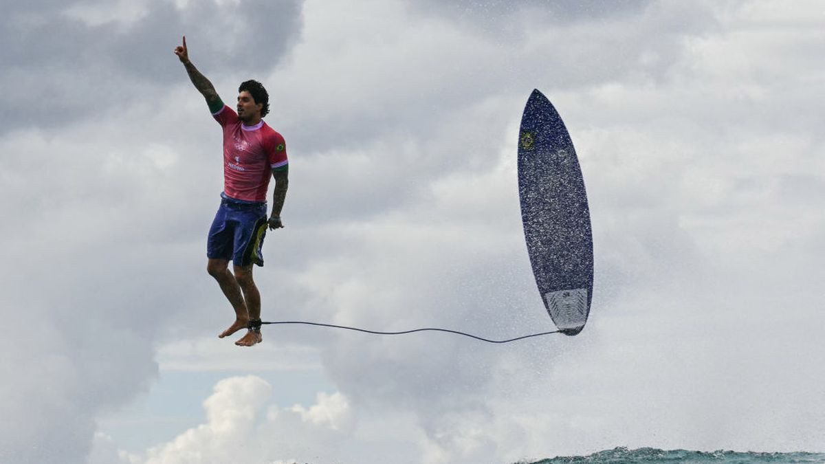 Brazil's Gabriel Medina reacts after getting a large wave in the 5th heat of the men's surfing round. GETTY IMAGES