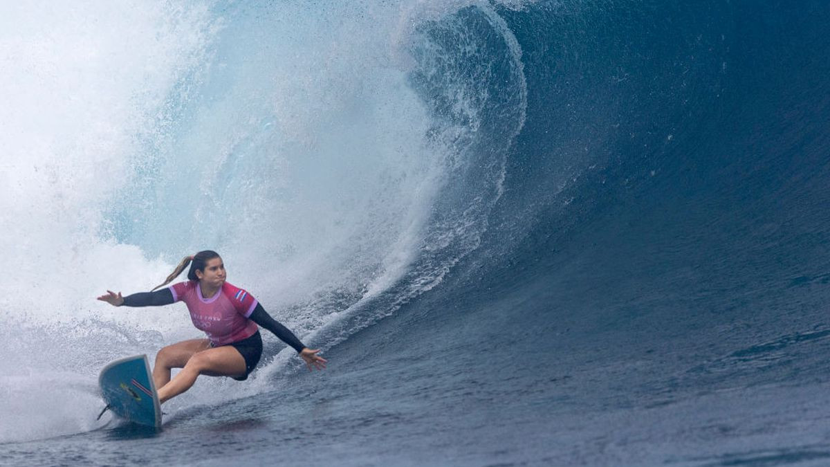 Brisa Hennessey of Team Costa Rica looks on after winning her heat during round three of women's surfing. GETTY IMAGES