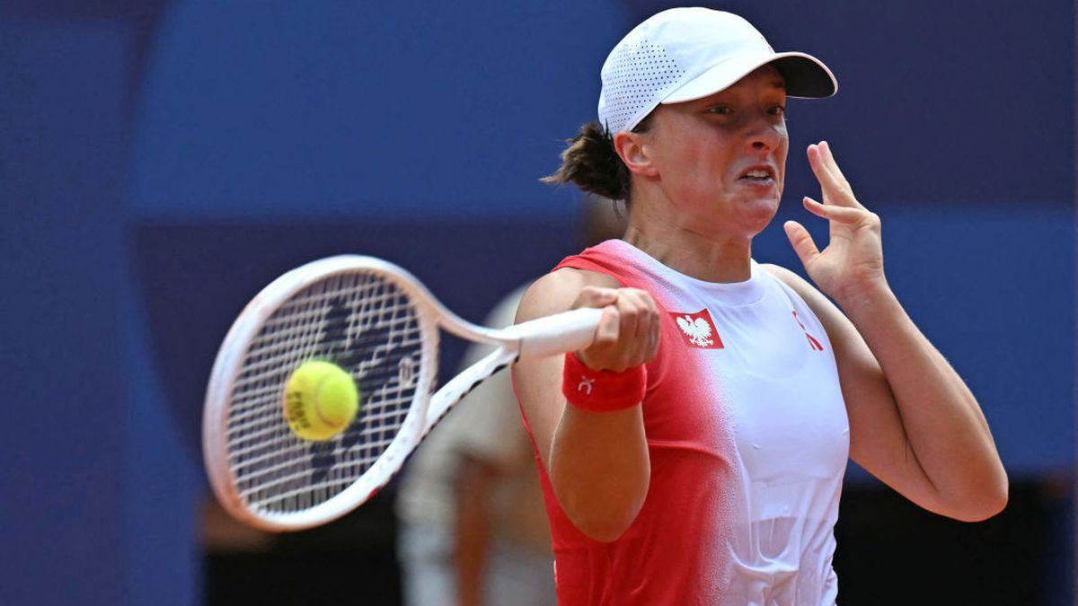 Poland's Iga Swiatek returns to Slovakia's Anna Karolina Schmiedlova during their Bronze Medal match. GETTY IMAGES