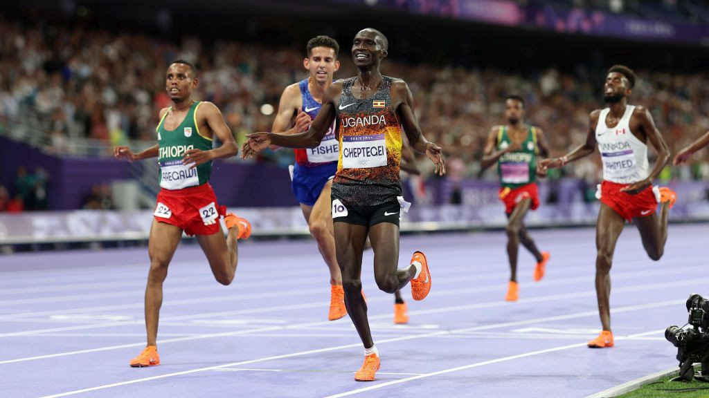 Joshua Cheptegei of Team Uganda celebrates winning the Men's 10,000m Final. GETTY IMAGES