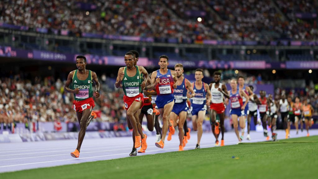 Selemon Barega of Team Ethiopia leads the group during the Men's 10000 Metres. GETTY IMAGES