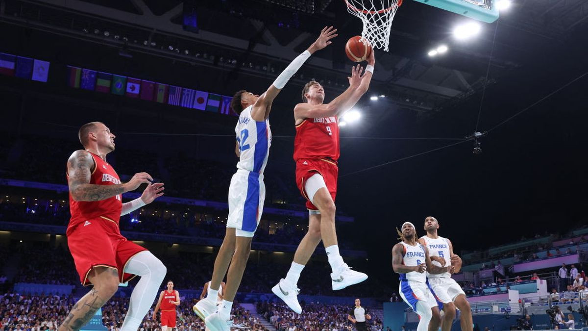 Franz Wagner goes to the basket past France's Victor Wembanyama. GETTY IMAGES