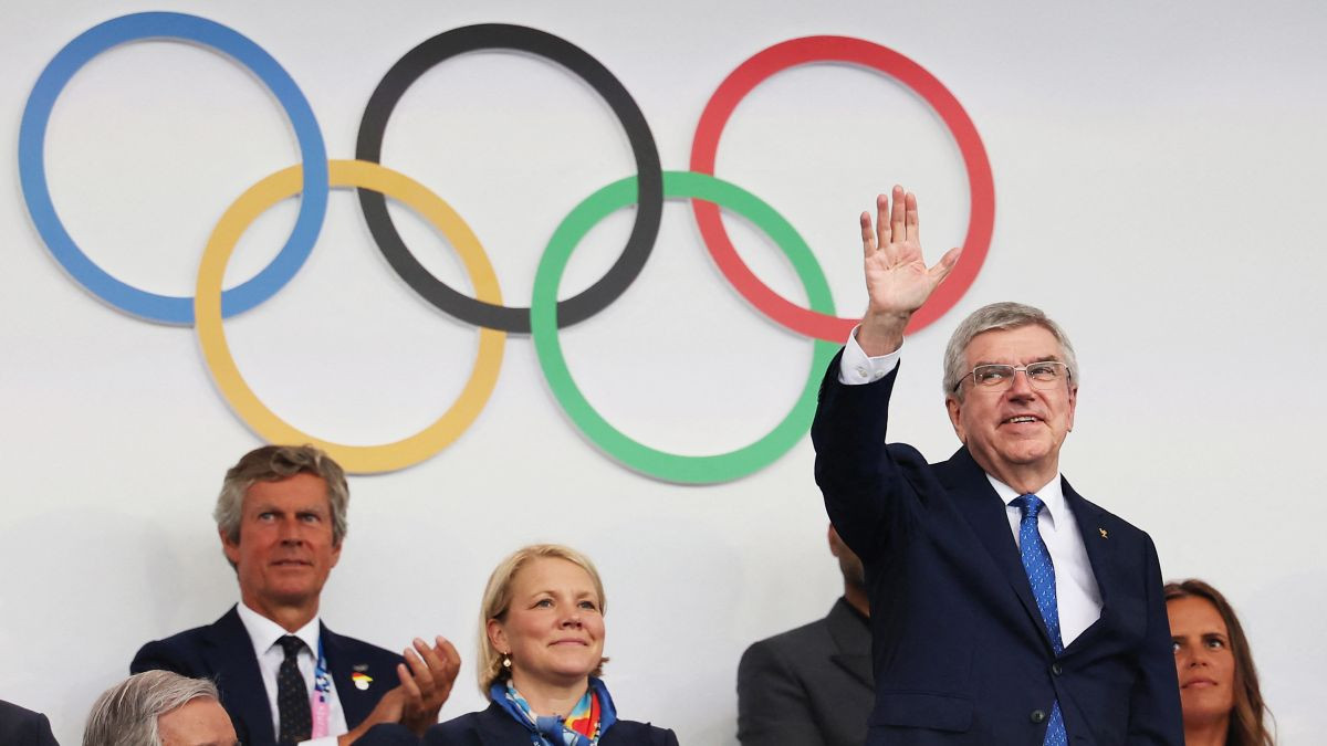 Thomas Bach, President of International Olympic Committee (IOC), and French President Emmanuel Macron gesture during the opening ceremony of the Olympic Games Paris 2024. GETTY IMAGES