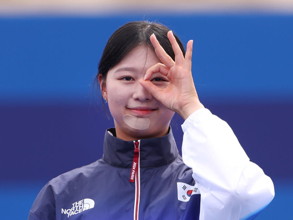 Triple gold-medallist Sihyeon Lim celebrating her win. GETTY IMAGES