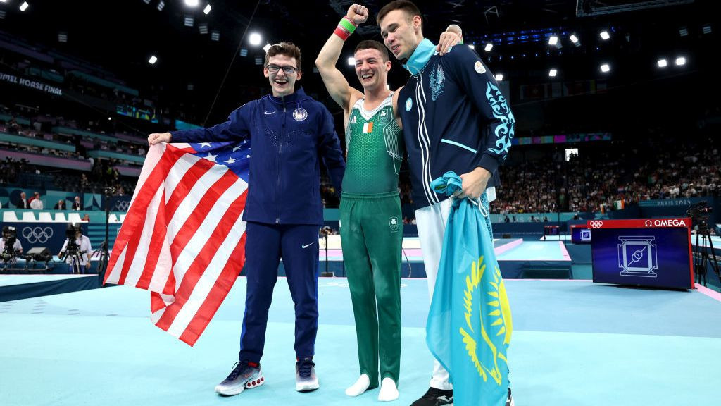 Bronze medalist Stephen Nedoroscik of Team United States, Gold medalist Rhys McClenaghan of Team Ireland and Silver medalist Nariman Kurbanov of Team Kazakhstan pose for a photo . GETTY IMAGES