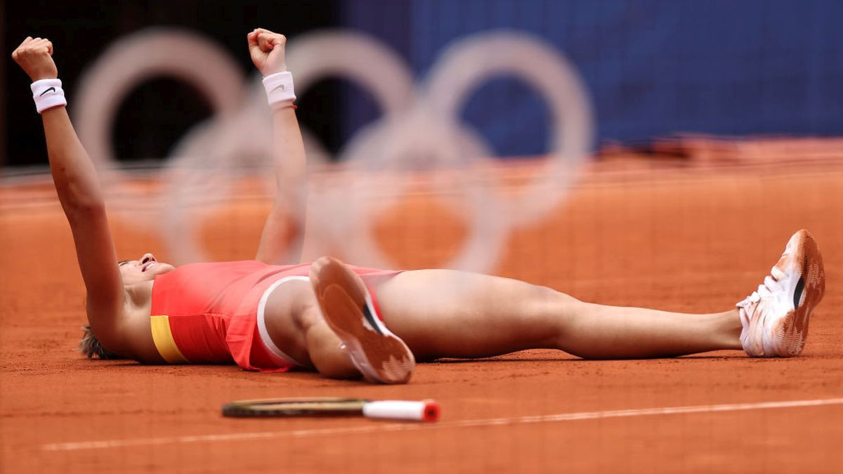 Qinwen Zheng celebrates match point during the final match against Donna Vekic. GETTY IMAGES
