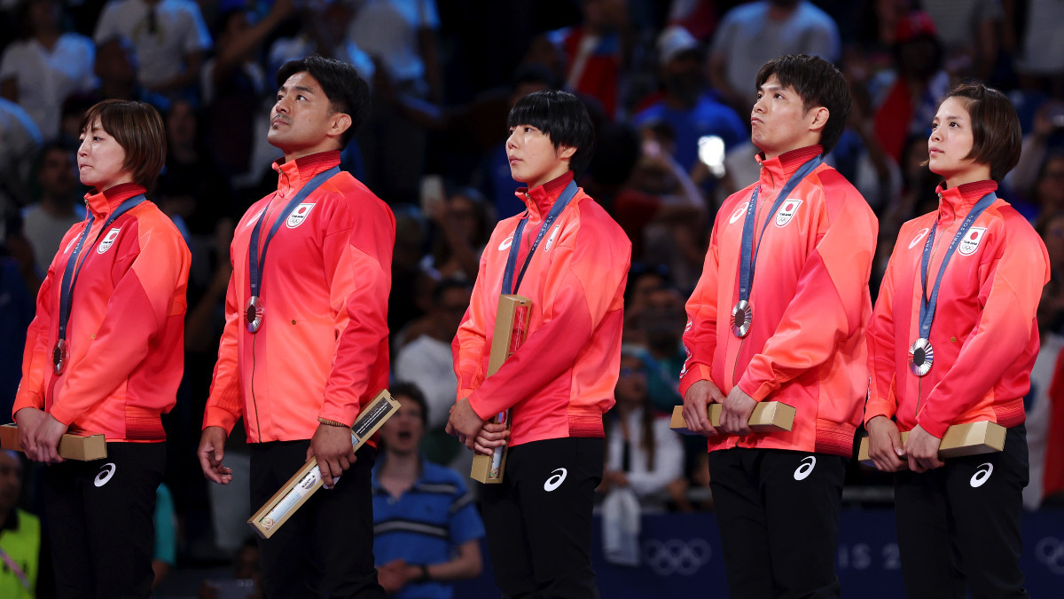 Japan's team with the silver medals. GETTY IMAGES