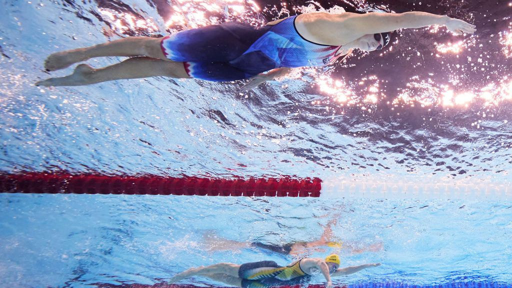 Katie Ledecky of Team United States and Ariarne Titmus of Team Australia compete in the Women's 800m Freestyle Final .  GETTY IMAGES