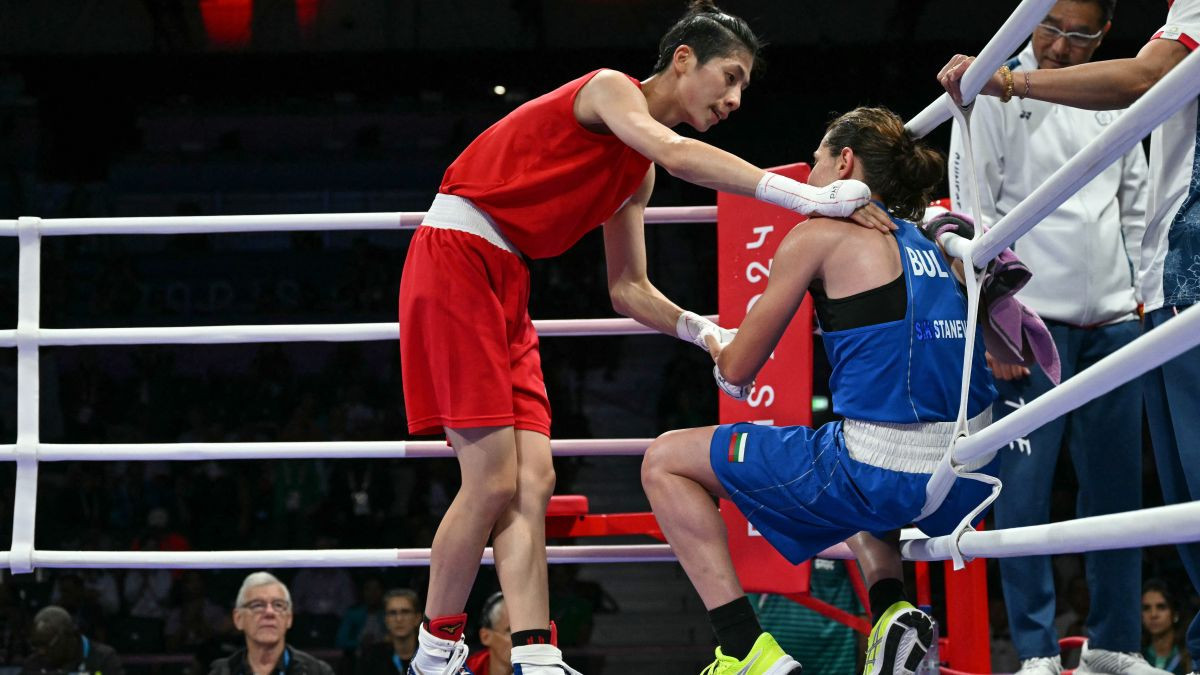 Lin Yu-ting reacts after beating Svetlana Kamenova Staneva in the women's 57kg quarter-final boxing. GETTY IMAGES