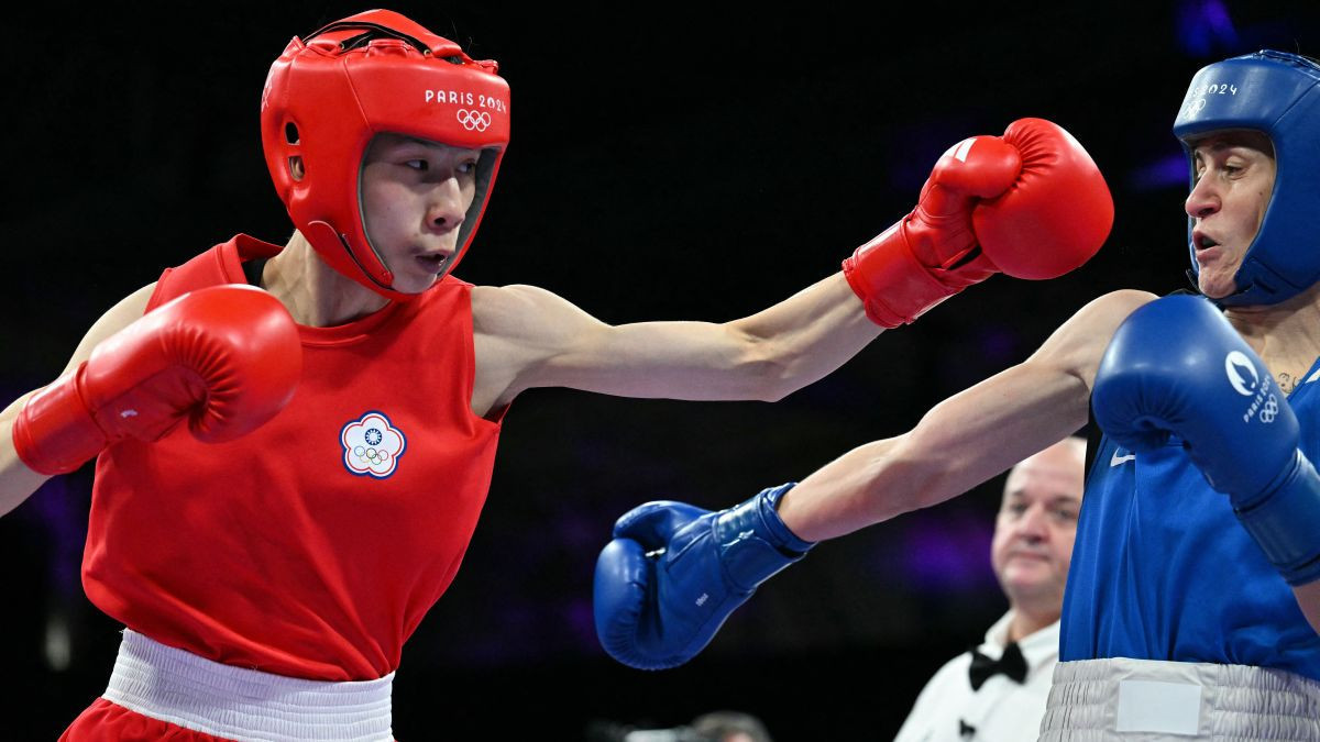 Taiwan's Lin Yu-ting and Bulgaria's Svetlana Kamenova Staneva compete in the women's 57kg quarter-final boxing match during the Paris 2024 Olympic Games. GETTY IMAGES