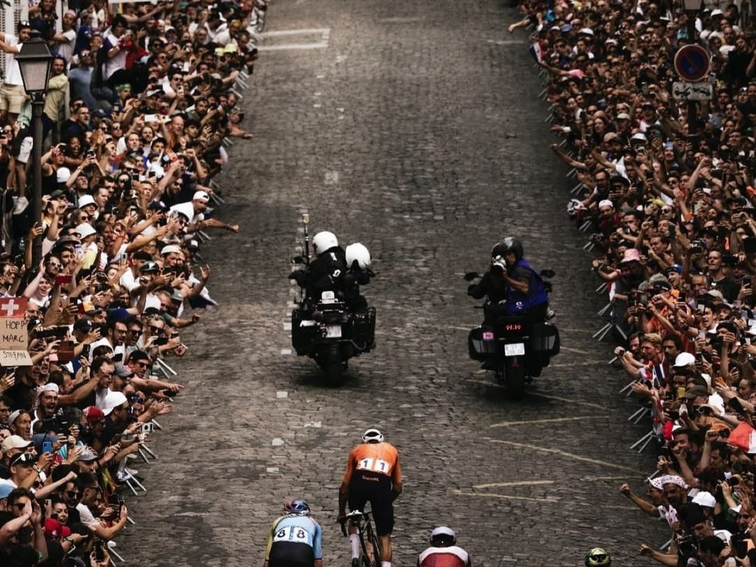 A photograph capturing thousands of supporters lining the sweeping Rue Lepic in Montmartre during the cycling road race has gone viral. X @MLaGattina