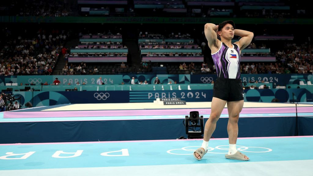 Carlos Edriel Yulo of Team Philippines celebrates winning the Gold medal during the Artistic Gymnastics Men's Vault Final 