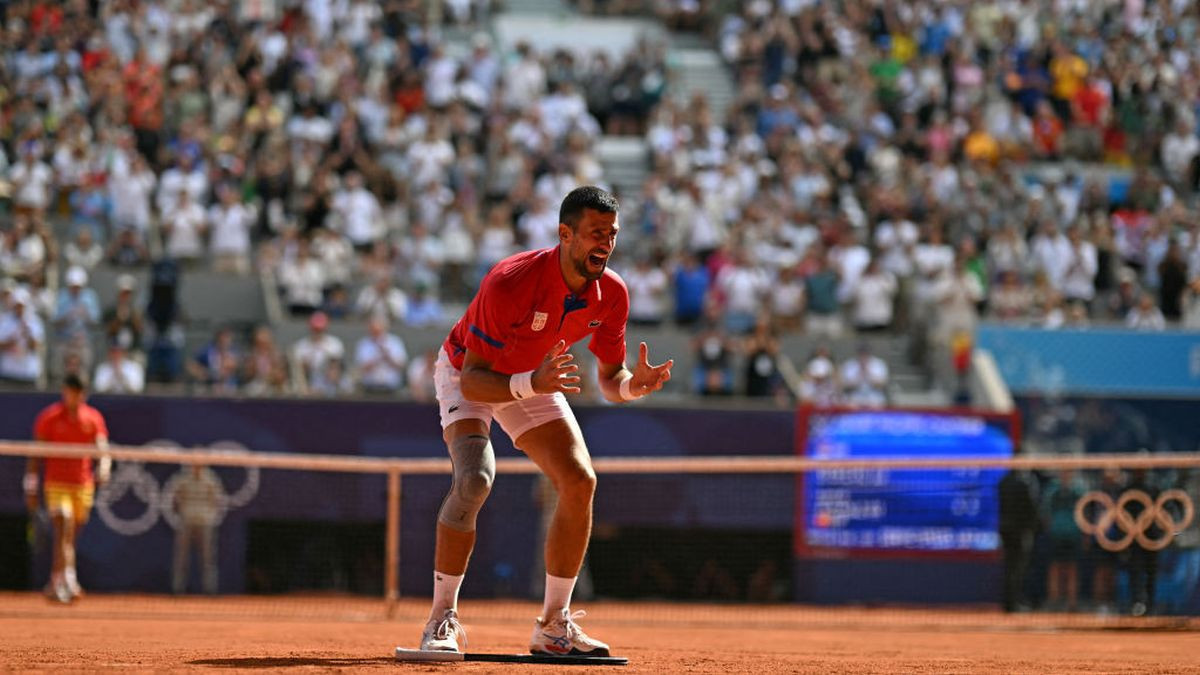 Serbia's Novak Djokovic reacts to beating Spain's Carlos Alcaraz in their men's singles final tennis match on Court Philippe-Chatrier at the Roland-Garros Stadium. GETTY IMAGES