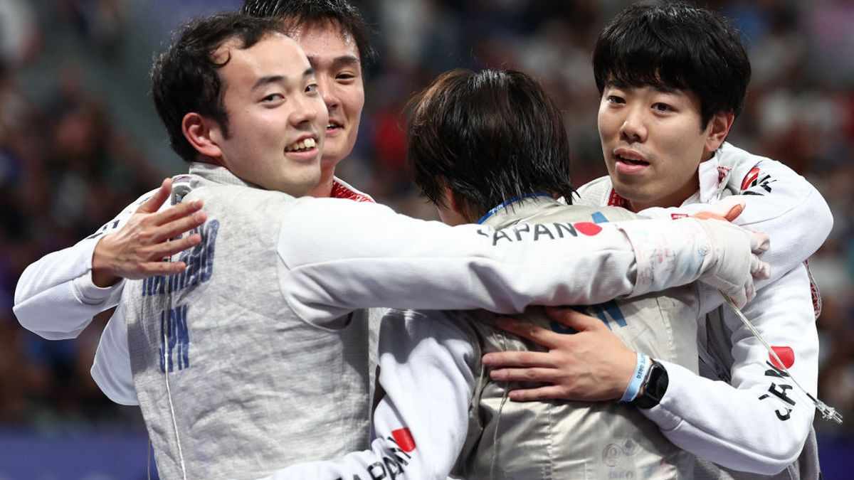 Japan's Yudai Nagano (L), Japan's Kyosuke Matsuyama, Japan's Kazuki Iimura and Japan's Takahiro Shikine celebrate after winning in the men's foil team semi-final bout between Japan and France during the Paris 2024 Olympic Games at the Grand Palais in Paris, on August 4. GETTY IMAGES