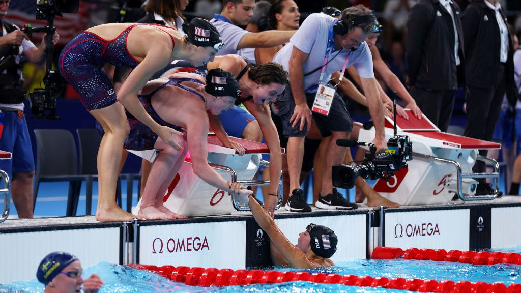 Regan Smith, Lilly King, Gretchen Walsh and Torri Huske of Team United States celebrate after winning gold in a world record- GETTY IMAGES